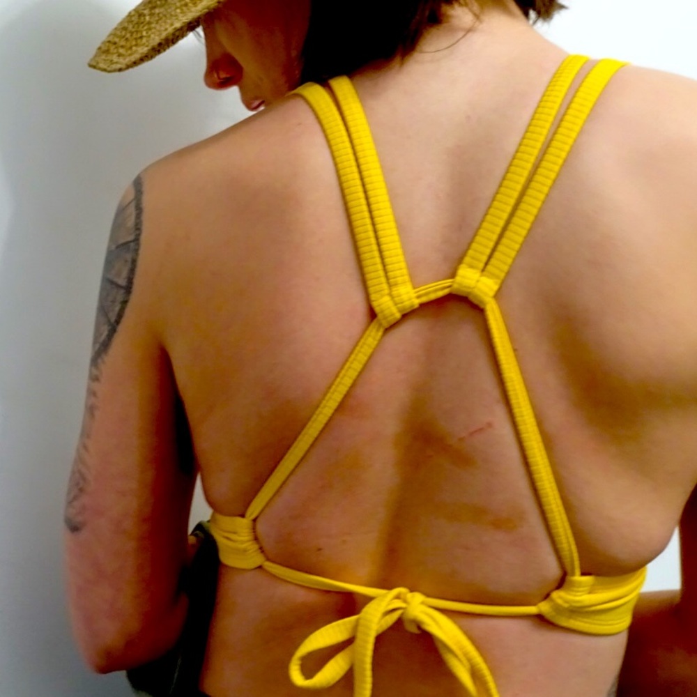 Yellow bikini top. V cool back